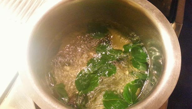 tulsi water. thinatamil |